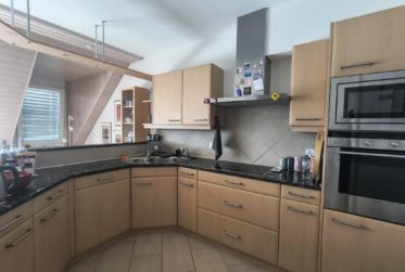 Appartement de 4.5 pièces dans les combles avec une situation idéale