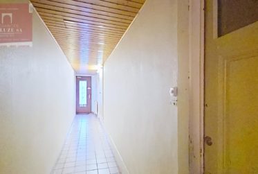 Immeuble de 3 appartements+commerce (loués)