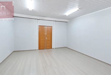 Immeuble de 3 appartements+commerce (loués)